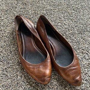 Gently used frye flat leather slip ons